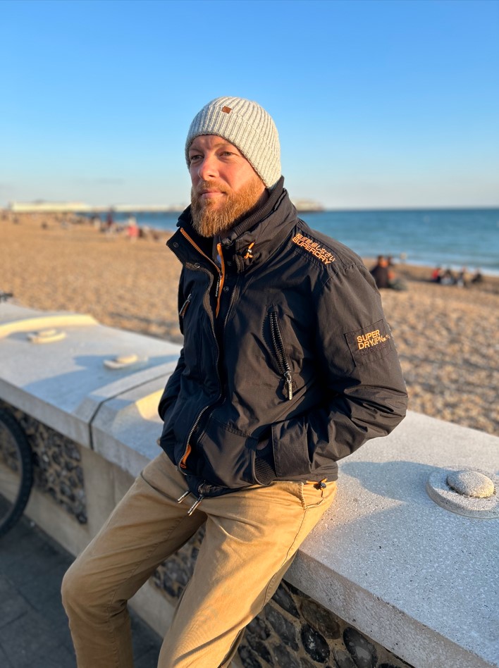 Dan Benoy beside Brighton beach
